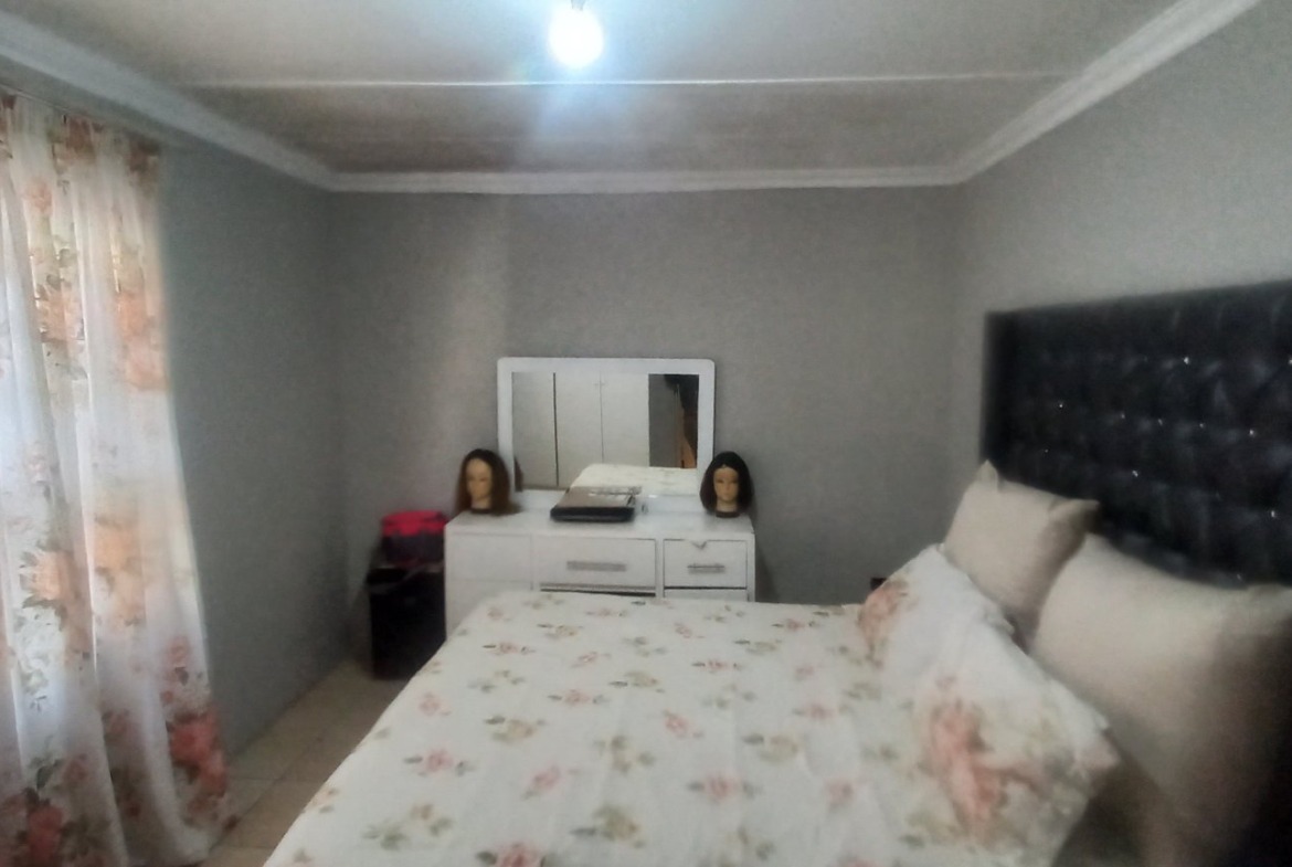 Prime Investment Opportunity in Amalinda Forest: 3-Bedroom House + 4 Income-Generating Flats!