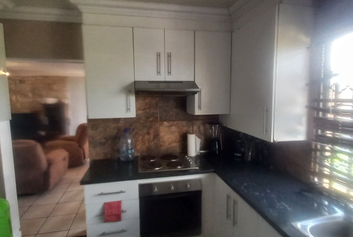Prime Investment Opportunity in Amalinda Forest: 3-Bedroom House + 4 Income-Generating Flats!