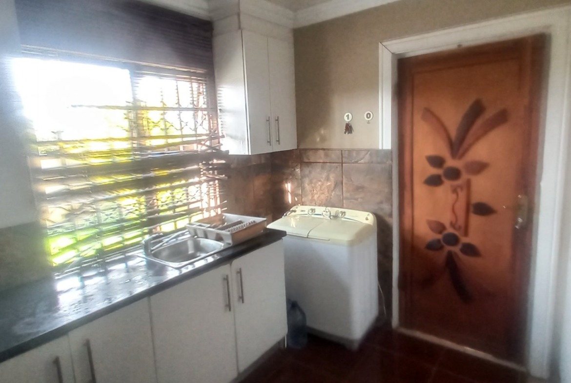 Prime Investment Opportunity in Amalinda Forest: 3-Bedroom House + 4 Income-Generating Flats!